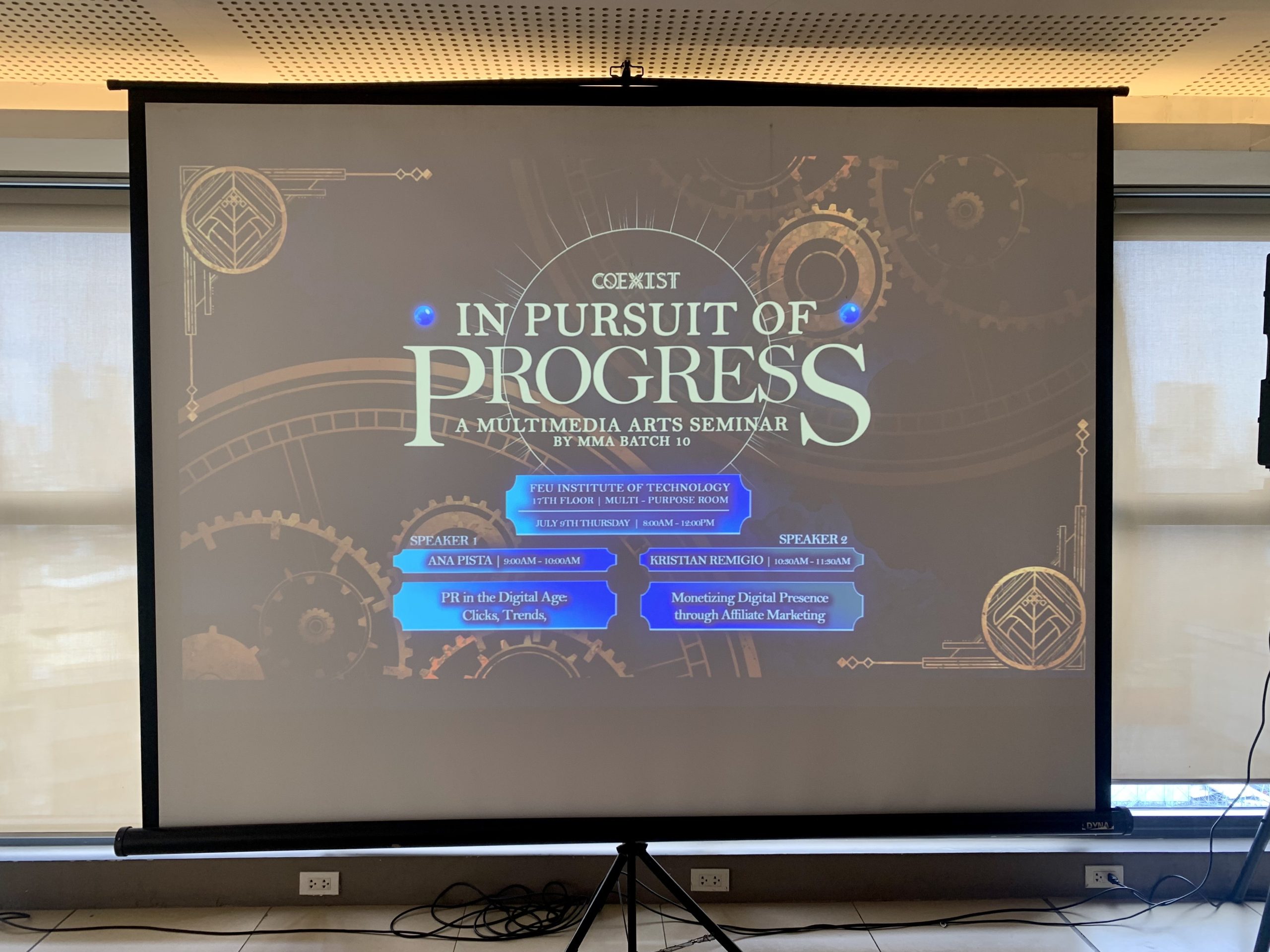 A presentation slide introduces CoeXist: In Pursuit of Progress, FEU Tech's Multimedia Arts seminar exploring the intersection of diverse creative perspectives and emerging digital trends.